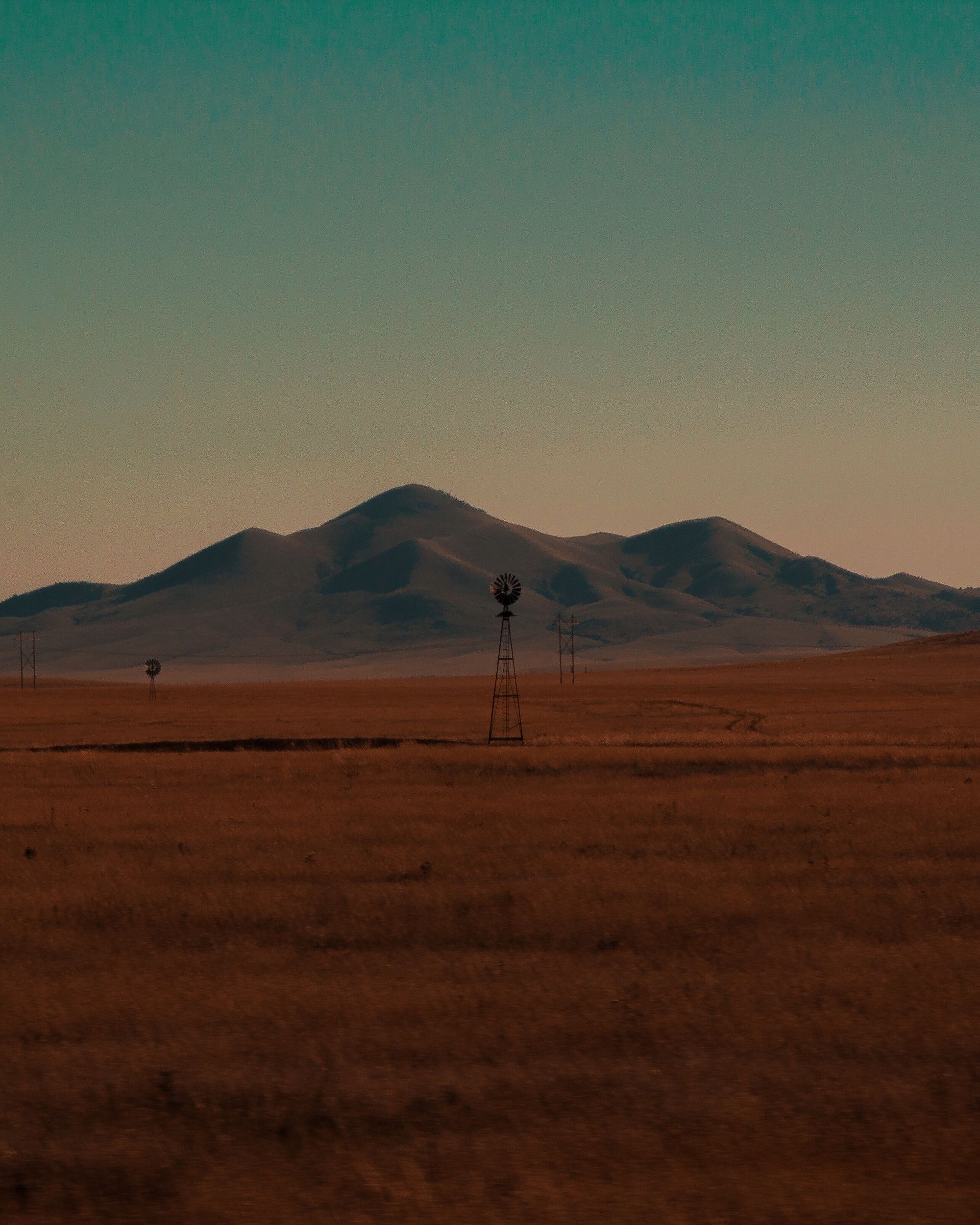 Wind turbine on a landscape field